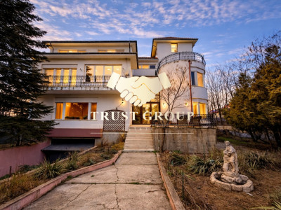 Casă individuală cu arhitectură deosebită și potențial investițional