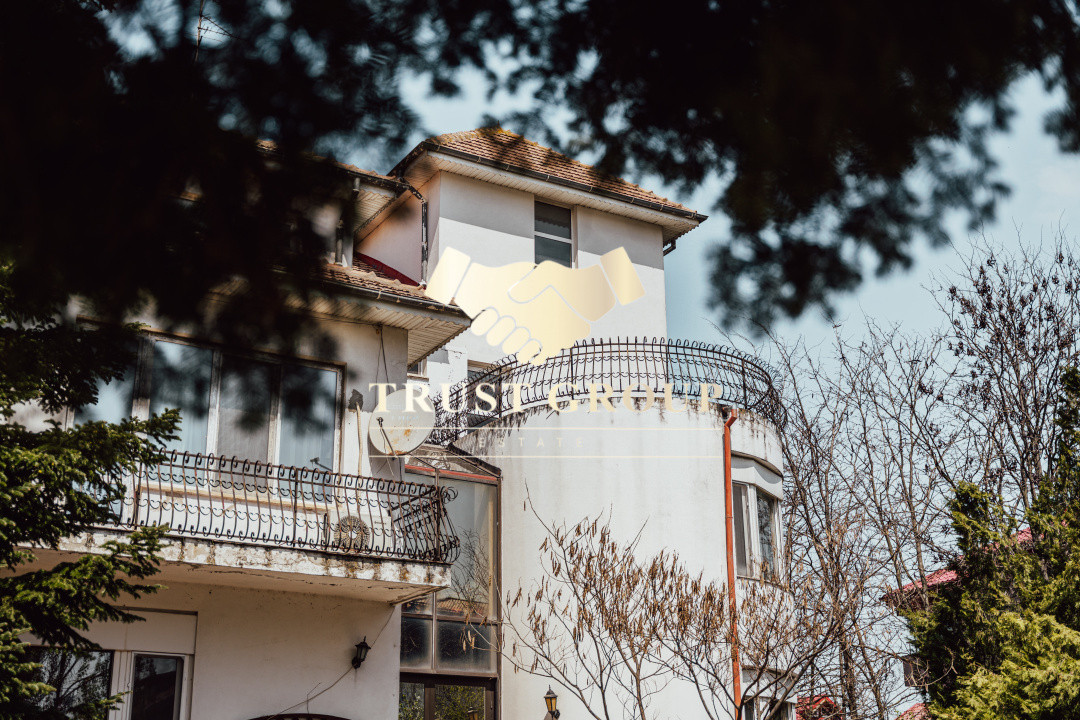 Casă individuală cu arhitectură deosebită și potențial investițional