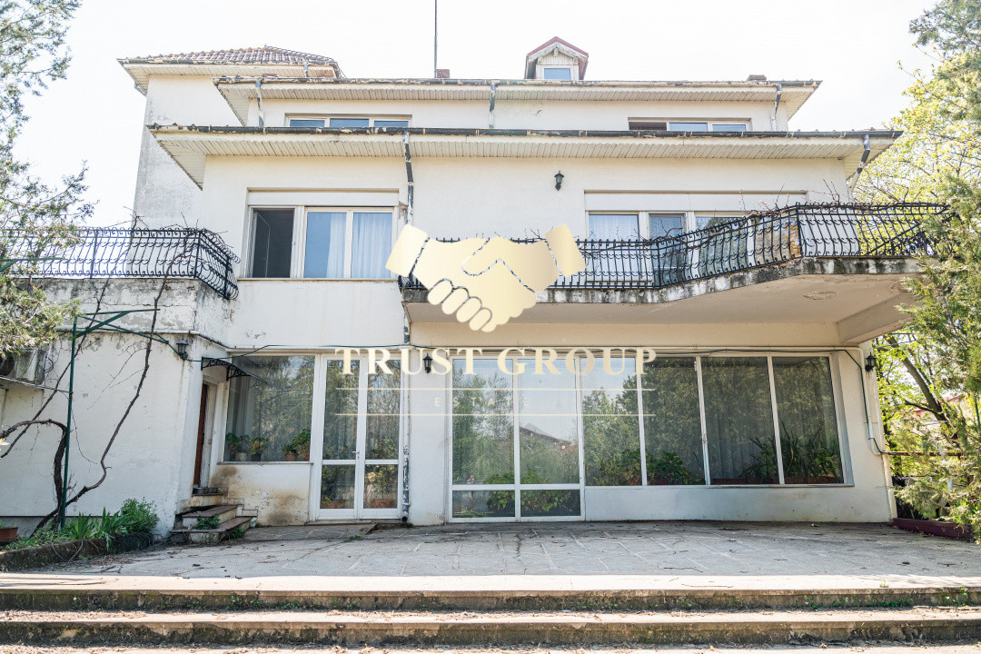 Casă individuală cu arhitectură deosebită și potențial investițional