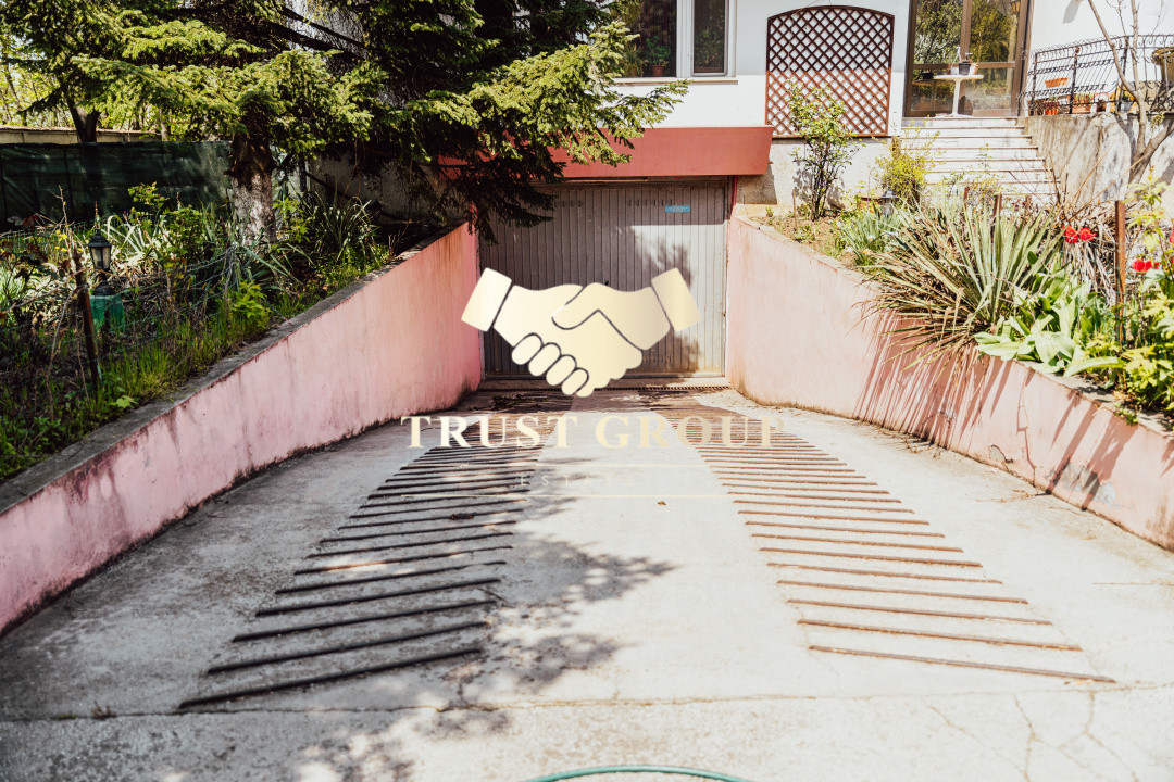 Casă individuală cu arhitectură deosebită și potențial investițional